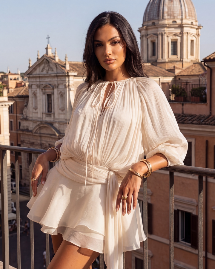 VIOLETA - VESTIDO MINI PLISADO CON VOLANTES CREMA